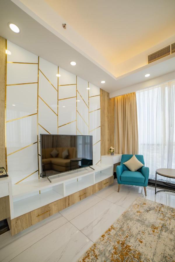 Platinum Coast Hotel Apartments Fujairah Exterior photo A television set