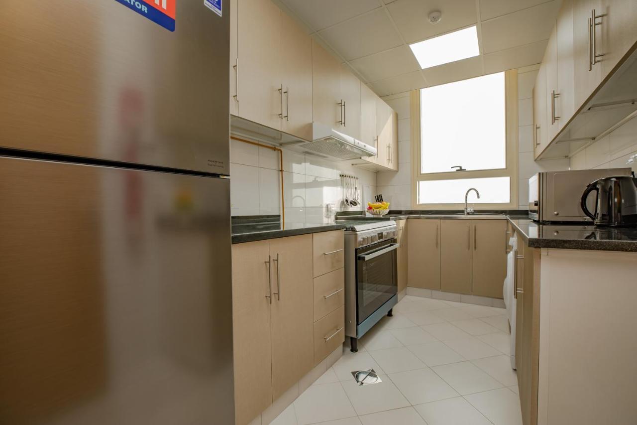 Platinum Coast Hotel Apartments Fujairah Exterior photo A typical kitchen
